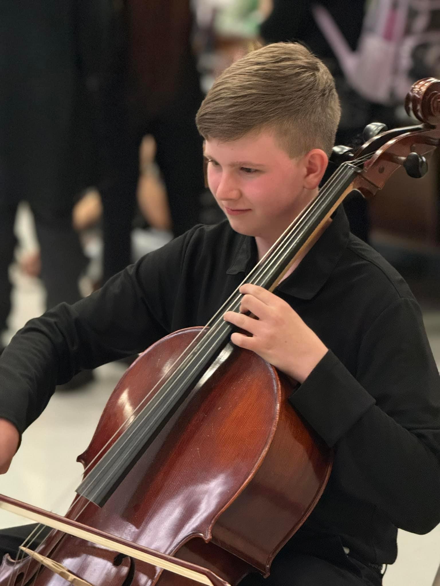 Robert Playing Cello at MNHS